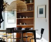 In the dining room, residents use designer chairs on skids