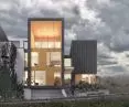 The facades are covered with wooden and composite panels