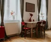 Apartment Noise, set of red chairs