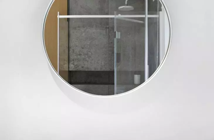 round mirror in the bathroom