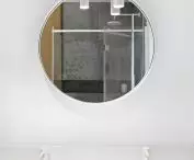 round mirror in the bathroom