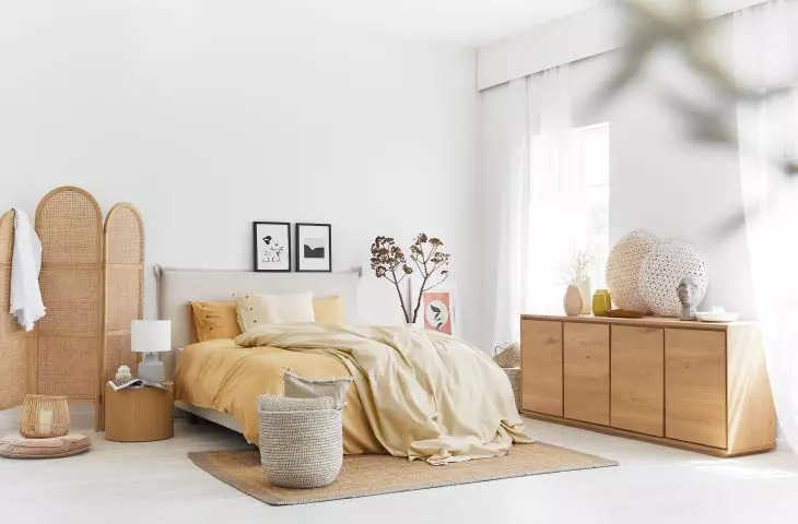 Bright bedroom with natural accessories