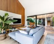 Interiors are warmed by natural wood