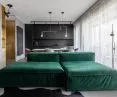 Green sofa to the main accent of the interior