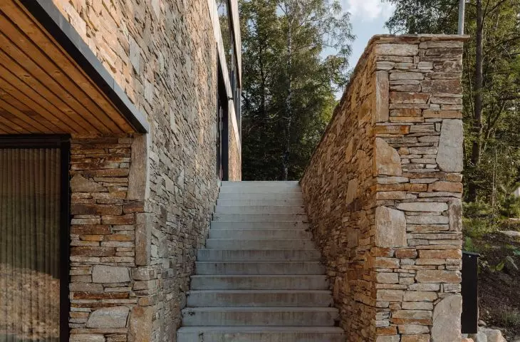 carefully composed arrangement of stones in the lower tier