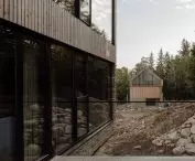 The first building houses eight independent apartments, while the second houses seven apartments and an underground parking garage