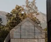 gable wall obscured by wooden slats refers to the typical gable boarding in this region