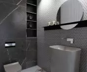 Geometric accents on the bathroom wall