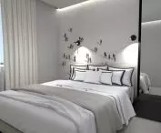 Bedroom with decorative wallpaper