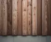 Wood on the facade and sandstone