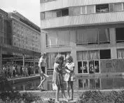 Children playing at the fountain in the Downtown Passage