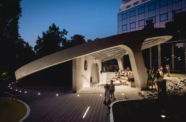 angled concrete ring unifies the block