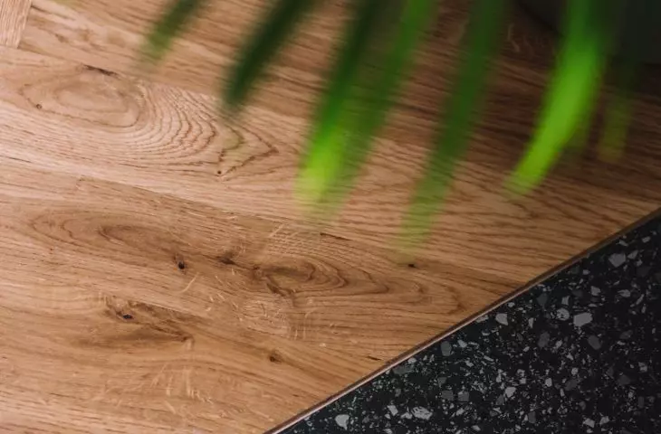 floor between kitchen and living room