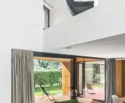 living room overlooking the open floor of the house