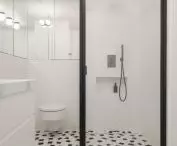 a steel shower stall and steel ventilation grilles were also designed and constructed for the project