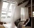 A well-lit attic can serve a variety of functions in the home