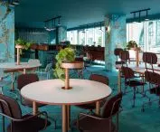 Common space tables with plant holders