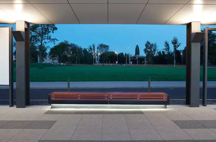 Modern Line: illuminated bench of polished architectural concrete with wooden seat - special project