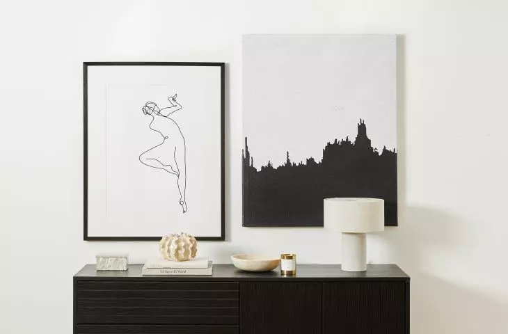 Black accessories create a modern interior