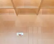 The grate supports the roof and at the same time lets daylight through
