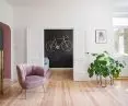 Spacious living room and golden radiator