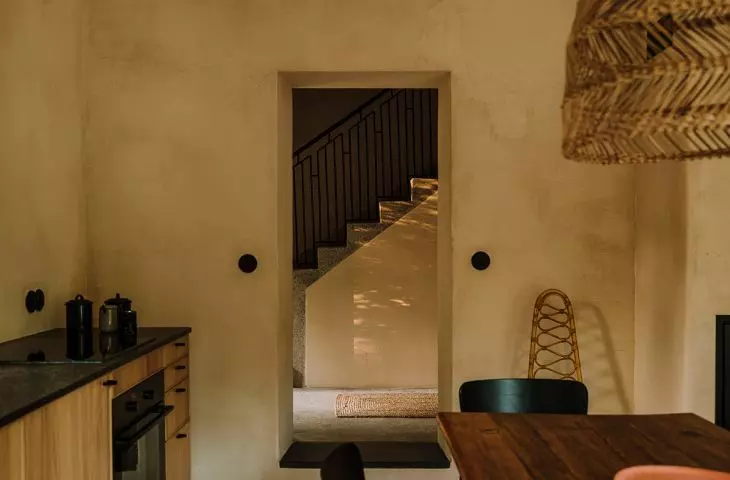 the interior is filled with natural colors and materials