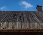 House in Pear Tree, wood clad roof