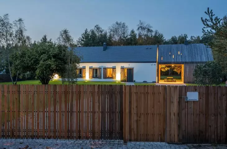 The house is reminiscent of a country house