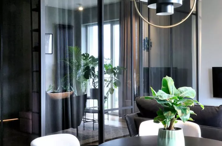 curtained glass walls of the bedroom