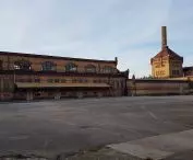 Old Slaughterhouse - the central part behind the main gate, left: the slaughterhouse building planned for adaptation into an auditorium.