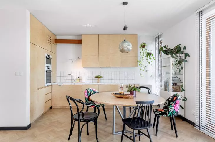 White tiles and plywood furniture 