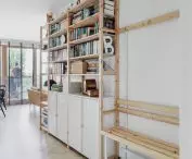 Architect designed a library in the hallway