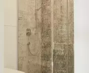 Spacious shower and silver elements 