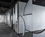 LOFT style office - glass partition wall with asymmetrical circles