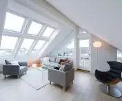 Windows optically enlarge attic space