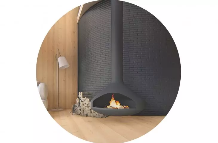 Brick wall and black fireplace