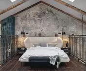 The mezzanine is non-invasively suspended in the middle part of the loft