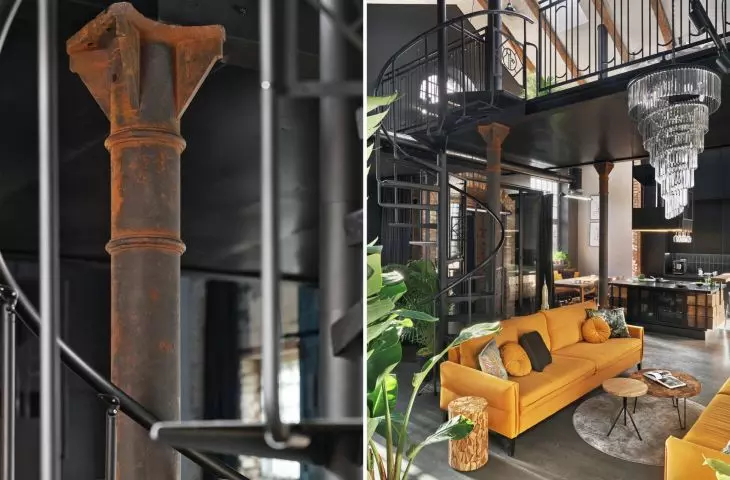 winding steel staircase and columns create interior character