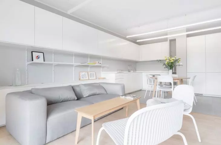 The apartment has three rooms: bedroom/office, bathroom and open space living room with kitchenette