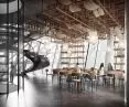 The overhang of the restaurant is supported by steel cables
