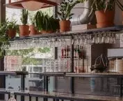 Along the bar, seating for guests of the establishment has also been designed