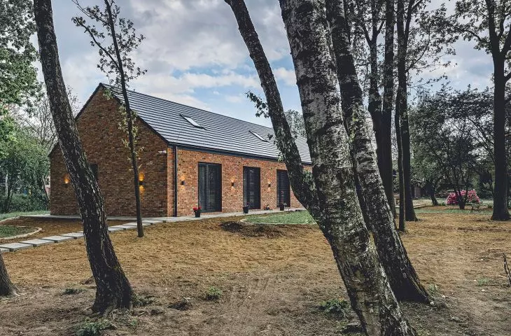 House on wooded plot