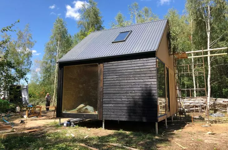 Black larch facade in BioHome 2 painted with linseed oil with soot