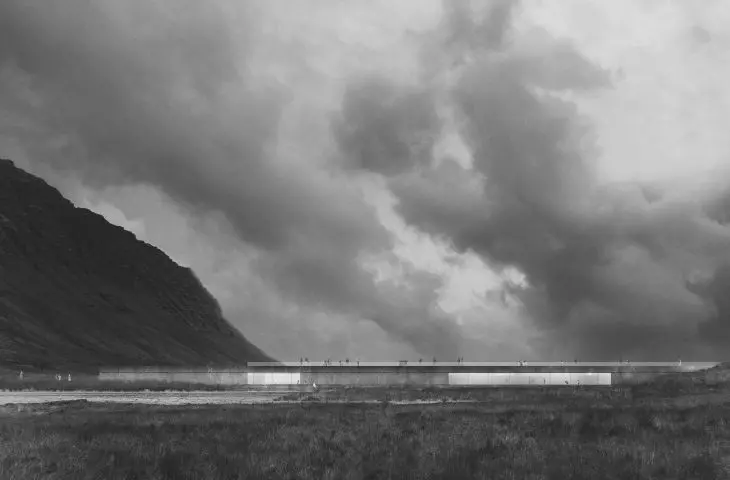 The building fits into the rugged landscape of Iceland