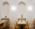 Arched alcoves and tables at BEAM Café