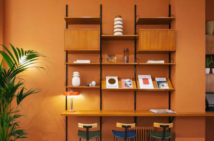 Royal shelving system w BEAM Café
