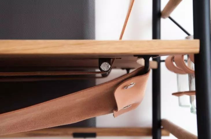 Leather cable storage compartment 