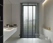 Bathroom kept in white and black