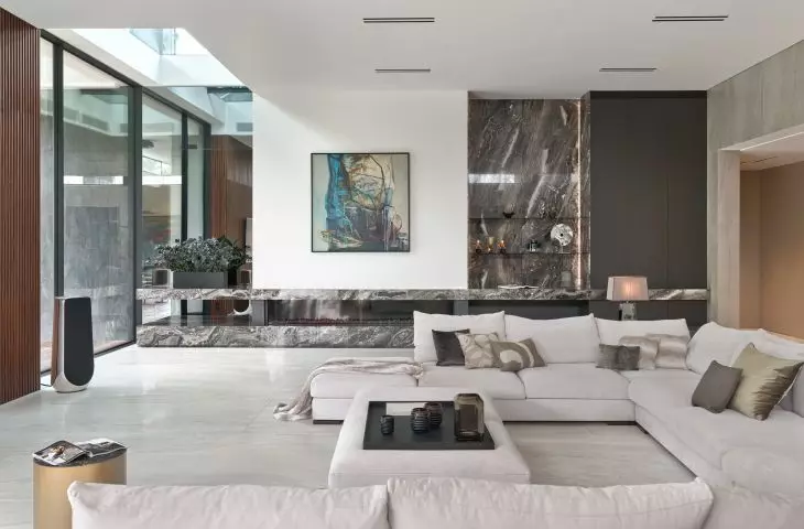 Living room with marble and art on the wall