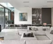 Living room with marble and art on the wall